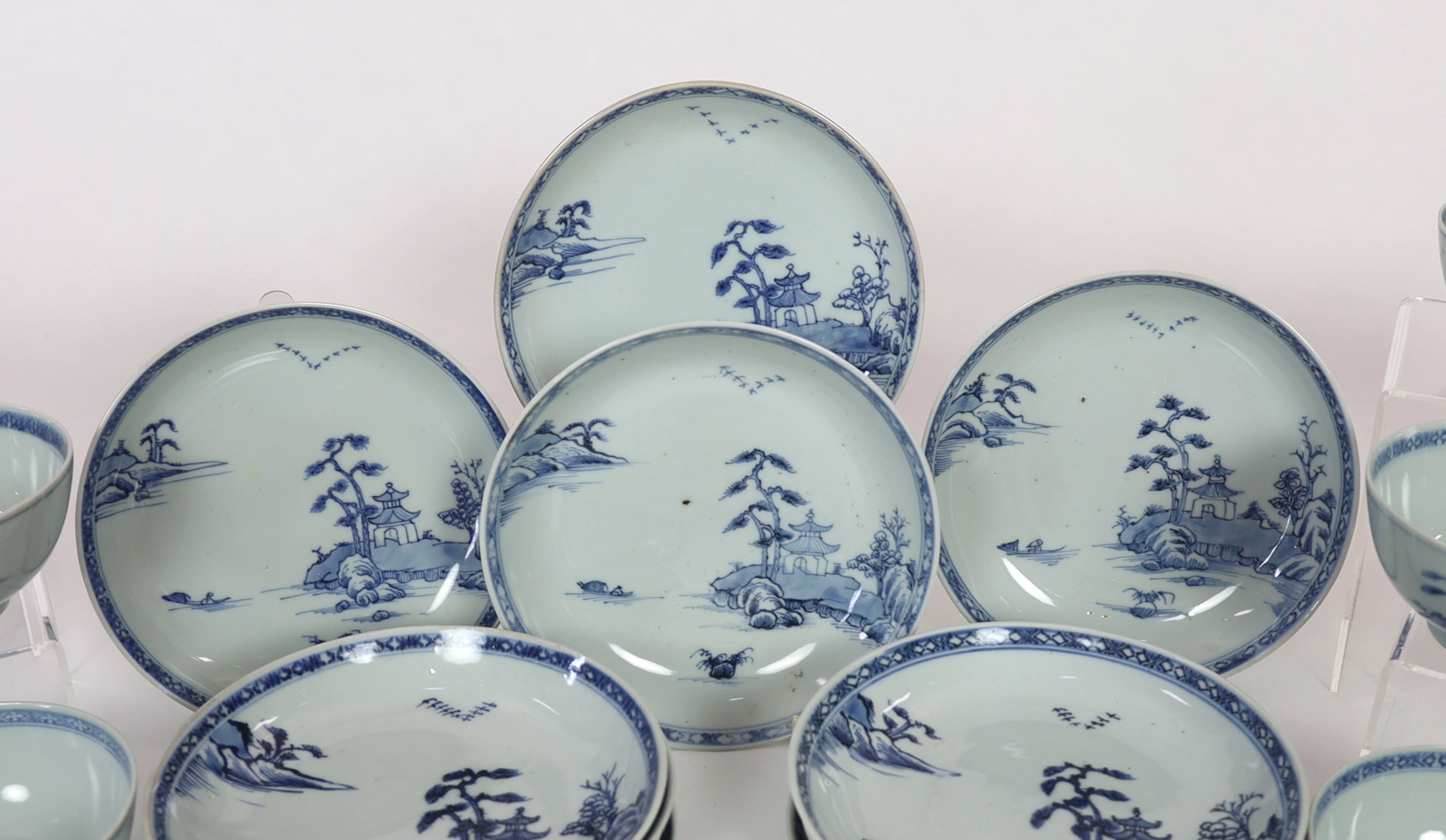 Twelve Chinese blue and white ‘Flying Geese’ bowls and saucer dishes, Nanking Cargo, c.1750